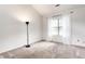Bedroom with vaulted ceilings, large window and modern floors at 9118 Hardwood Ct, Indianapolis, IN 46250