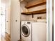 This laundry room includes washer and dryer at 9118 Hardwood Ct, Indianapolis, IN 46250
