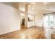Bright living room with wood floors, vaulted ceilings, and an open layout, creating a spacious and airy atmosphere at 9118 Hardwood Ct, Indianapolis, IN 46250