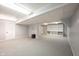 Finished basement featuring gray carpet, white trim, and recessed lighting at 9127 Pointe Ct, Fishers, IN 46037