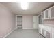 Spacious finished basement offers ample storage with built-in cabinets and shelving, plus convenient access to storage at 9127 Pointe Ct, Fishers, IN 46037