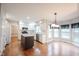 Spacious kitchen with center island, stainless appliances, granite counters, and a dedicated eating area at 9127 Pointe Ct, Fishers, IN 46037