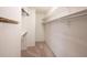 Walk-in closet with built-in shelving and ample hanging space, perfect for organization at 9127 Pointe Ct, Fishers, IN 46037