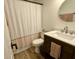 Cozy bathroom features a vanity with plenty of storage and a shower-tub combo at 9277 Embers Way, Indianapolis, IN 46250