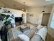 Spacious living room with stylish furnishings, stone fireplace, and large windows creating a comfortable space at 9277 Embers Way, Indianapolis, IN 46250