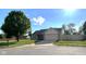Charming single-story home featuring a well-manicured lawn and a spacious two-car garage on a sunny day at 948 Kitner Ave, Avon, IN 46123
