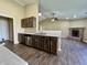 Well-equipped kitchen featuring stainless appliances, granite countertops, and dark wood cabinetry at 948 Kitner Ave, Avon, IN 46123