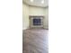 Cozy living room featuring a brick fireplace and tile flooring at 948 Kitner Ave, Avon, IN 46123