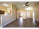 Bright, open living space with a ceiling fan and access to multiple rooms at 948 Kitner Ave, Avon, IN 46123