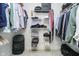 Well-organized walk-in closet featuring shelving and hanging rods for efficient storage solutions at 10144 Water Crest Dr, Fishers, IN 46038