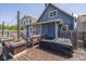 Backyard deck featuring a seating area, hot tub, and string lights perfect for entertaining at 1132 Evison St, Indianapolis, IN 46203