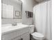 Bright bathroom with white vanity and shower with gray accents at 11419 Niagara Dr, Fishers, IN 46037
