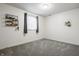 Well-lit bedroom featuring gray carpeting and neutral walls at 11419 Niagara Dr, Fishers, IN 46037