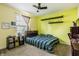 Bright bedroom with hard wood floors and space for a bookshelf at 11419 Niagara Dr, Fishers, IN 46037