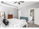 Bright, spacious main bedroom with tray ceiling and view into the ensuite bathroom at 11419 Niagara Dr, Fishers, IN 46037