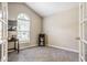 Comfortable office space with ample natural light, carpet and access through double doors at 11419 Niagara Dr, Fishers, IN 46037
