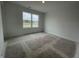 Bedroom featuring unfinished flooring and a bright window at 1204 Mcbride St, Greenfield, IN 46140
