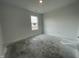 Bedroom with a single window and unfinished flooring at 1204 Mcbride St, Greenfield, IN 46140