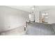 Spacious bedroom with carpet, leading to an ensuite bathroom and featuring a bed and bench at 12388 Camberley Ln, Carmel, IN 46033