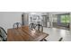 The dining area showcases an open layout leading to a well-equipped kitchen and a cozy living space at 12388 Camberley Ln, Carmel, IN 46033