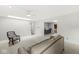Open-concept living room boasts lots of space and natural light, flowing into dining area at 12388 Camberley Ln, Carmel, IN 46033