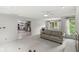 Inviting living room showcases an open floor plan, and a seamless flow to the kitchen at 12388 Camberley Ln, Carmel, IN 46033