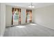 Inviting bedroom with plush carpet, bright windows, and soft natural light at 12409 Dellfield W Blvd, Carmel, IN 46033