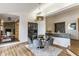 Cozy dining area featuring a modern light fixture and elegant decor at 12469 Springmill Rd, Carmel, IN 46032