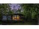 Charming home nestled in the woods with large windows offering an abundance of natural light at 12469 Springmill Rd, Carmel, IN 46032