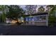 Grand home with expansive driveway and large windows, offering a luxurious and comfortable living experience at 12469 Springmill Rd, Carmel, IN 46032