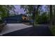 Spacious residence with an attached garage and well-maintained driveway, blending comfort with functionality at 12469 Springmill Rd, Carmel, IN 46032