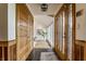 Elegant foyer featuring wood accents, slate flooring, and bright natural light enhancing the home's welcoming atmosphere at 12469 Springmill Rd, Carmel, IN 46032