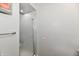 Bathroom featuring a shower with glass doors, gray walls, and towel rack at 1310 Kings Cove Ct, Indianapolis, IN 46260