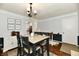 Inviting dining room featuring a table, chairs, and stylish decor at 1310 Kings Cove Ct, Indianapolis, IN 46260
