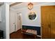 Traditional entryway with a decorative mirror and gold door at 1310 Kings Cove Ct, Indianapolis, IN 46260
