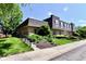 Inviting brick townhouse with a well-manicured lawn and charming curb appeal at 1310 Kings Cove Ct, Indianapolis, IN 46260