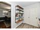 Open shelving for décor between kitchen and dining area at 1310 Kings Cove Ct, Indianapolis, IN 46260