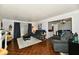 Open living room and dining area with comfortable seating and natural light at 1310 Kings Cove Ct, Indianapolis, IN 46260