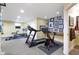 Finished basement featuring home gym, treadmill, stationary bike, and full bathroom at 14094 Pecos Ct, Carmel, IN 46033