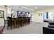 Basement bar features custom lighting, ample seating, and stylish finishes at 14094 Pecos Ct, Carmel, IN 46033