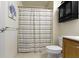 Cozy bathroom with a toilet, vanity with mirror, and shower with curtain at 14094 Pecos Ct, Carmel, IN 46033