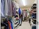 Walk in closet with shelving and ample storage space for clothes and accessories at 14094 Pecos Ct, Carmel, IN 46033