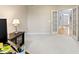 Bright office space featuring neutral carpeting and French doors leading to the foyer at 14094 Pecos Ct, Carmel, IN 46033