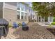 Charming patio with stone flooring, outdoor seating, and a built-in grill at 14094 Pecos Ct, Carmel, IN 46033