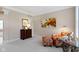 Comfortable sitting room featuring a decorative chair, side table, and neutral walls perfect for relaxation at 14094 Pecos Ct, Carmel, IN 46033