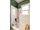 Bathroom featuring shower with updated shower head at 1431 N Bolton Ave, Indianapolis, IN 46219