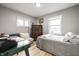 Bright bedroom with lots of natural light, wood floors, and neutral walls at 1431 N Bolton Ave, Indianapolis, IN 46219