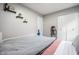 Bedroom with neutral walls, shelving, and closet at 1431 N Bolton Ave, Indianapolis, IN 46219