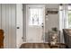 Bright entryway featuring a white door with sheer curtains and a welcoming decor at 1431 N Bolton Ave, Indianapolis, IN 46219