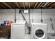 Laundry room with white washer and dryer at 1431 N Bolton Ave, Indianapolis, IN 46219